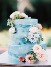 A Light Blue Cake For A Wedding