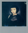 © Stocksy - Polaroid silver frame scan of a cute gothic woman