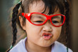 © Stocksy - Portrait of Asian schoolgirl