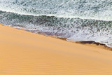 Fototapeta Niebo - Wellen - Düne gegen Meer