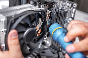 Installing or repair the air cooling system of the PC processor.