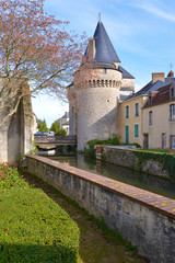 Wall Mural - Keep of the fortified gate Saint-Julien on the Huisne river at La-Ferté-Bernard, a commune in the Sarthe department in the Pays de la Loire region in north-western France.