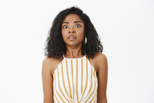 Oops Smell Problems. Portrait Of Stunned Anxious Good-looking African American Woman With Curly Hairstyle Being In Stupor From Nervousness And Shock Hearing Loud Yell Behind Back Over Gray Wall