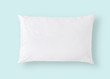 White pillow on blue background isolated with clipping path for bedding mockup design template