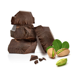 Wall Mural - Broken dark chocolate bars stack with pistachios and broken chocolate isolated on white background