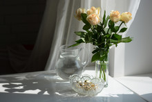 White Still Life With A Jug Of Water And Cream Roses