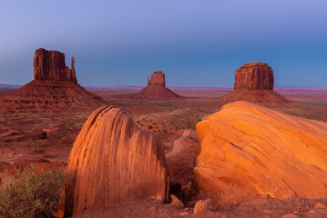 Wall Mural - East and West Mitten Buttes, and Merrick Butte at dusk, Monument Valley Navajo Tribal Park on the Arizona-Utah border, USA