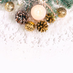 Wall Mural - Christmas snow background. Burning candle, pine branches and cones