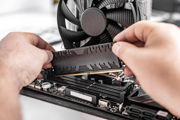 Poster - Installing random access memory into PC.