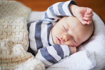 Adorable baby girl sleeping in the crib