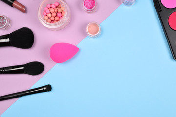 Professional makeup products with cosmetic beauty products, blushes, eye liner, eye lashes, brushes and tools.