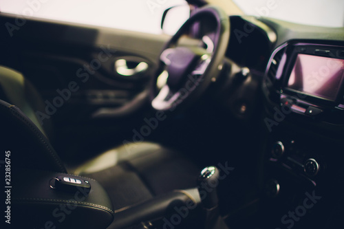 Fotomural  Closeup inside vehicle of wireless key ignition