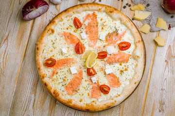 Wall Mural - Pizza with salmon and Philadelphia cheese