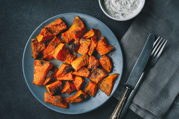 Top view of roasted pumpkin in rustic style