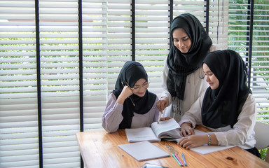 Muslim education activities in classroom at school, happy children learning.