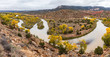 Bend in the Rio Chama river with autumn color trees