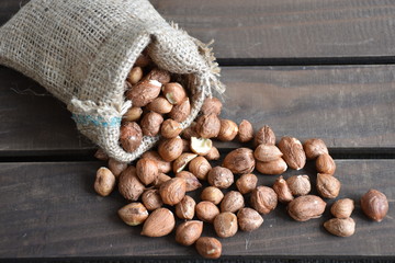 High angle of the hazelnuts on the wooden table