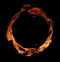 Fire - A Ring Created By The Flame And Large Burning Flames On A Black Background