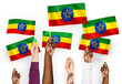 © Rawpixel.com - Hands waving flags of Ethiopia