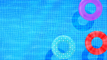 Swim rings on swimming pool water background. Inflatable rubber toy. Realistic summertime illustration. Summer vacation or trip safety item. Top view swimming circles.