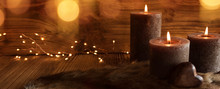 Decoration With Candles On Wooden Background