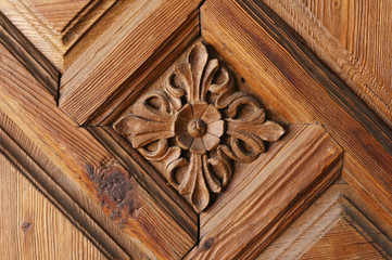 Pattern of flower carved on wood background