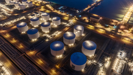 Poster - Tanker at Oil refinery factory at night for energy or gas industry or transportation background.