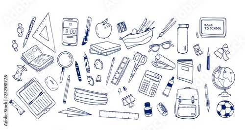 Fotografía Bundle of school supplies or stationery hand drawn with contour lines on white background