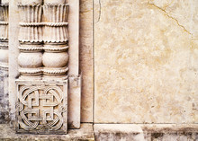 Wall Facade With Columns And With Floral Bas-relief. Architectural Decorative Element, Background