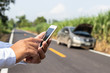 © praewpailyn - Businessman calling for assistance with his car broken. car insurance concept.
