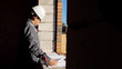 © lenblr - Man with paper draft in building under construction