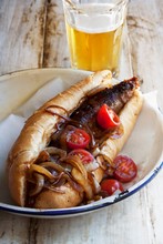 Hot Dog Made With Boerewors (S. African Sausage), Tomato & Onion Relish