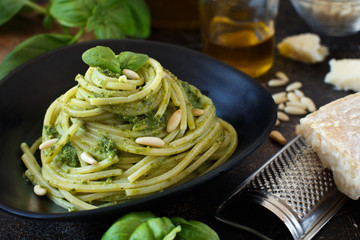 Spaghetti pasta with pesto sauce