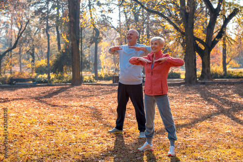 Fotografía Active senior couple exercising outdoor in park