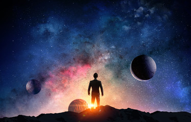 Wall Mural - businessman and cosmos concept