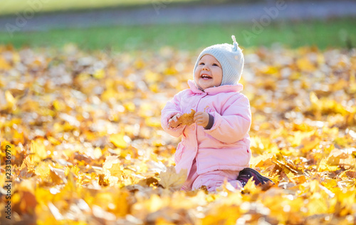 Cute Baby Girl Playing With Leaves And Laughing In Autumn Park Buy This Stock Photo And Explore Similar Images At Adobe Stock Adobe Stock