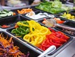 Salad bar buffet are available for sale in the food supermarket which there are many fresh vegetable, fruit and cereal grain in the tray for customer to buy back to eat at home, Healthy diet