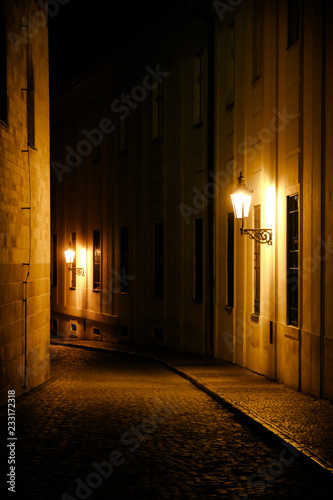 Old Lanterns Illuminating A Dark Alleyway Medieval Street At Night In Prague Czech Republic Low Key