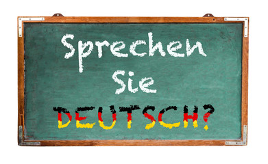 Fototapete - “Sprechen Sie Deutsch?” (in German language, Do you speak German?) written on a wide green old grungy vintage wooden chalkboard or retro blackboard with frame isolated on white background.