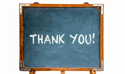 Fototapete - Thank you! text message in white chalk letters written on a school blue old grungy vintage wooden chalkboard or blackboard with frame and stand isolated on white background.