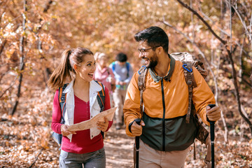 Wall Mural - Group of hikers in the woods.