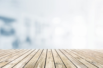 Wall Mural - Wood table top on blur background -for display or montage your products.