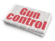 © Maksim Kabakou - Safety concept: Pixelated red text Gun Control on Newspaper background, 3D rendering