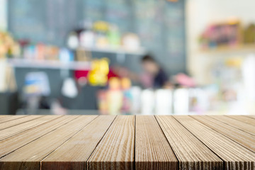 Wall Mural - Wood table top on shiny bokeh background