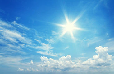 Wall Mural - Sun in blue sky.