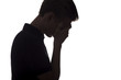 © Creatopic - silhouette of a sad guy on a white isolated background