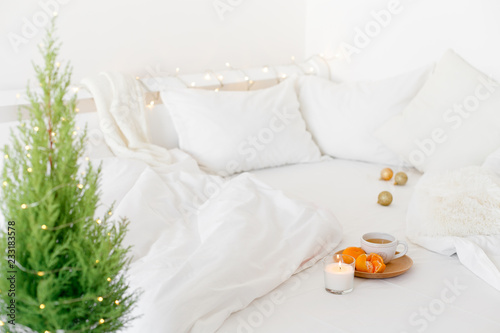 White Cozy Bedroom With Holiday Decoration Bed With White