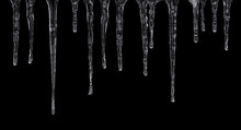 Close Up Of Icicles Isolated On Black Background