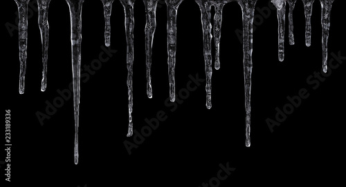 Fotografía Close up of icicles isolated on black background