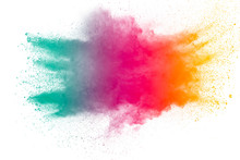 Freeze Motion Of Color Powder Exploding On White Background.